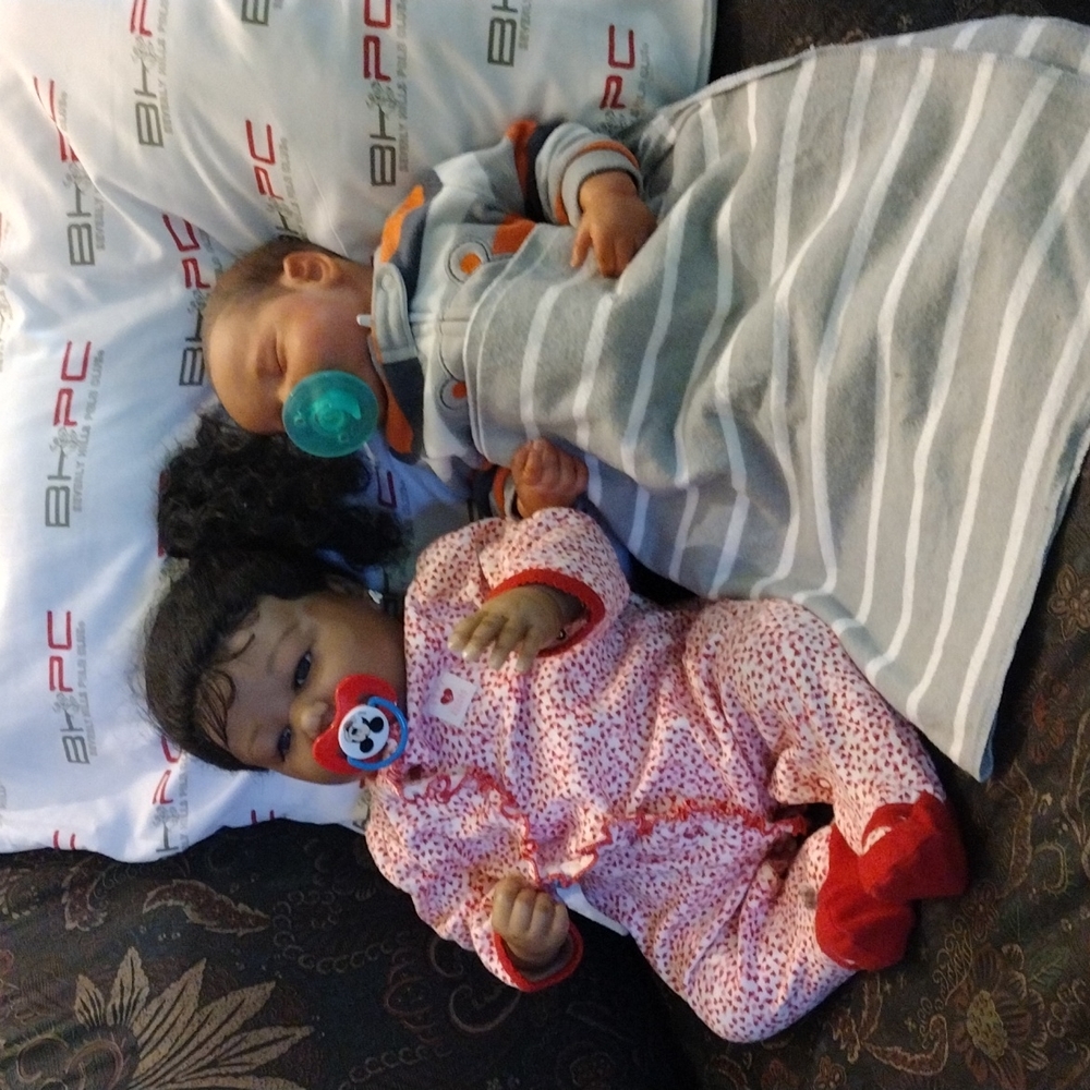 Reborn baby dolls, he is going for $300 and she is going for $400